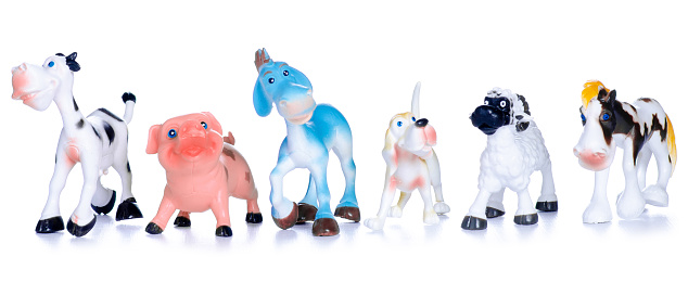 Children's toys animal figures on white background isolation
