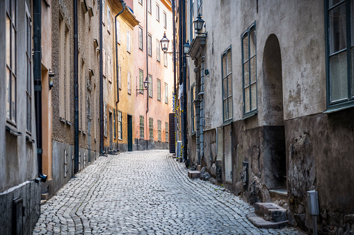 Street with old houses in the old historic center of the medieval city of Bruges, Belgium