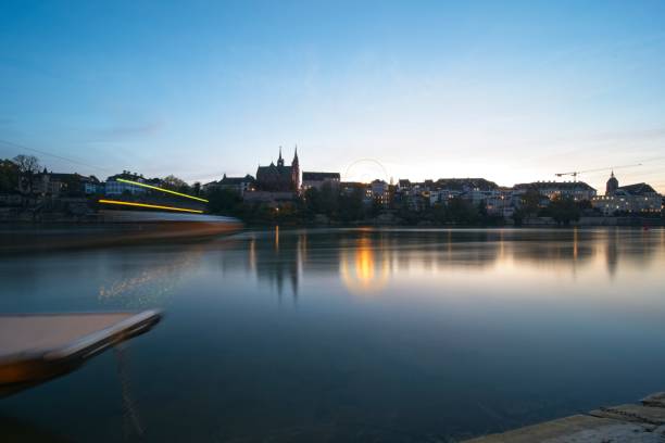 istock basel switzerland at rhine river in twilight. 1454407079