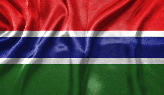 Gambia flag wave close up. Full page Gambia flying flag. Highly detailed realistic 3D rendering.