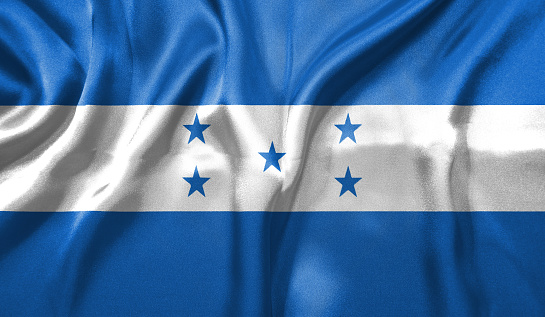 Honduras flag wave close up. Full page Honduras flying flag. Highly detailed realistic 3D rendering.