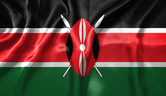 Kenya flag wave close up. Full page Kenya flying flag. Highly detailed realistic 3D rendering.