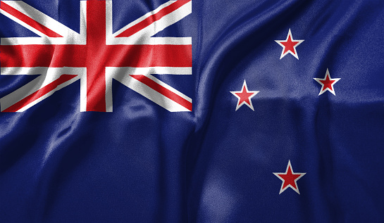 New Zealand flag wave close up. Full page New Zealand flying flag. Highly detailed realistic 3D rendering.