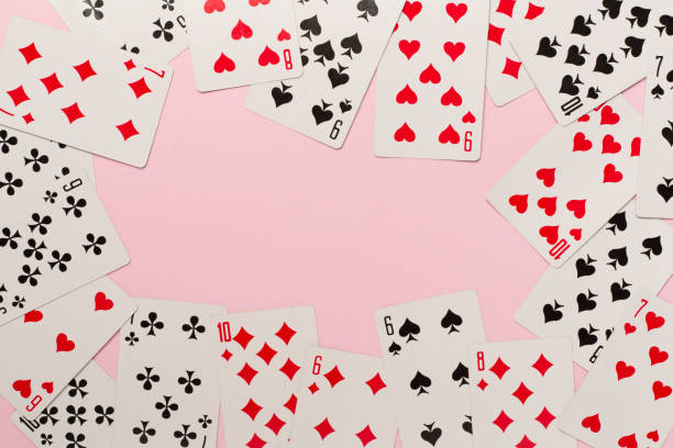 istock Playing cards on color background. Gambling concept. Top view 1454409819