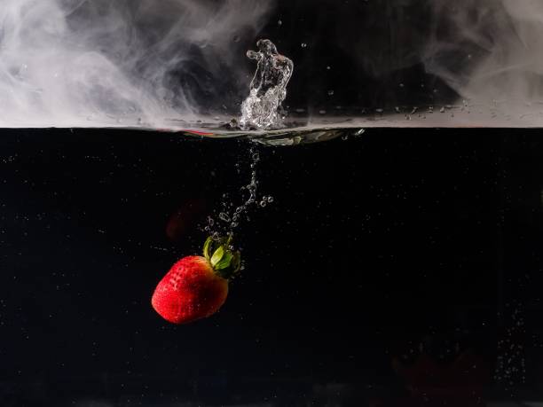 Strawberry diving in water