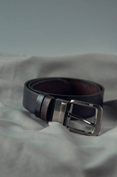 istock Men's branded belts in black and brown 1454414762
