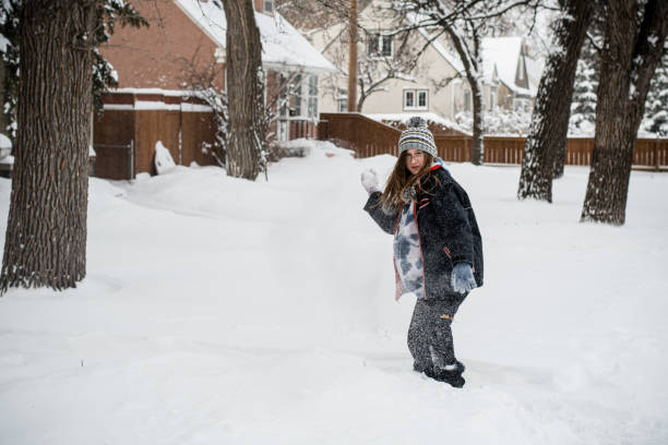 istock Throwing snowballs at me 1454416173