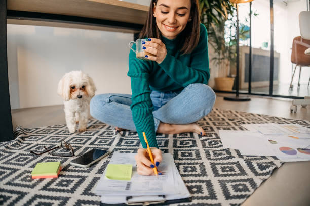 istock Young woman working from home 1454431632