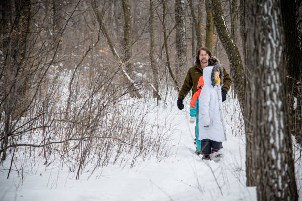 istock father and sons winter hike 1454432590