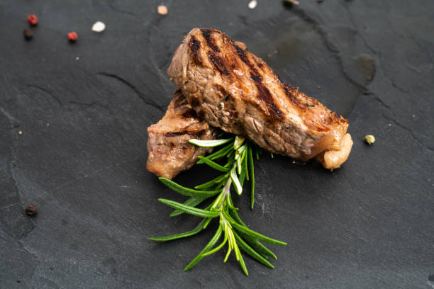 istock Grilled ribeye beef steak, herbs and spices 1454432661