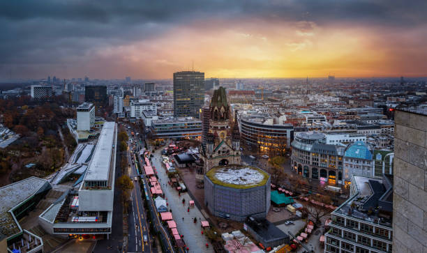 Beautiful winter sunrise view of the City Center West skyline of Berlin Beautiful winter sunrise view of the City Center West skyline of Berlin, Germany, with Memorial Church and Kurfürstendamm kaiser wilhelm memorial church stock pictures, royalty-free photos & images