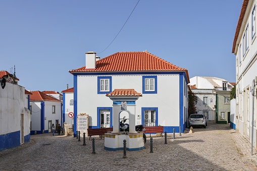 Ericeira, Portugal – October 02, 2022: View over the historic buildings through the streets of the village of Ericeira, Portugal
