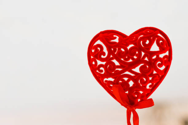 Decorative red heart for valentine's day on a white background.
