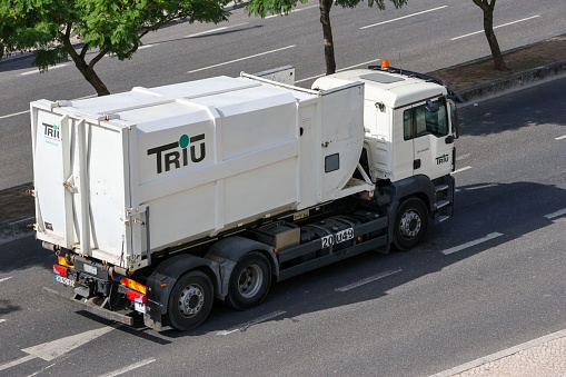 Lisbon, Portugal – April 27, 2022: Company vehicle TRIU Industrial and Urban Waste Techniques in Lisbon