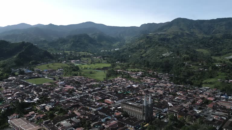 Medellin Mountains Aerial Drone Top Notch Above Jardin in Colonial Humid Valley Neighbourhood, Houses and Clear Skyline