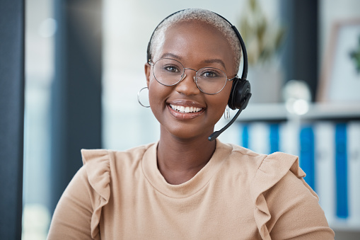 Call center, contact and smile with portrait of black woman in telemarketing, customer support and communication. Consulting, contact us and networking with employee working on kpi, crm and sales