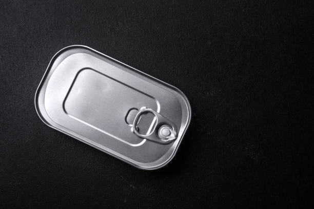 istock Tin or aluminum rectangular can of canned food with a key 1454443845