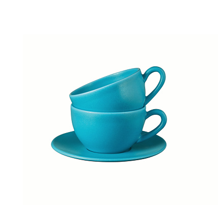 Blue porcelain coffee cup on white shelf