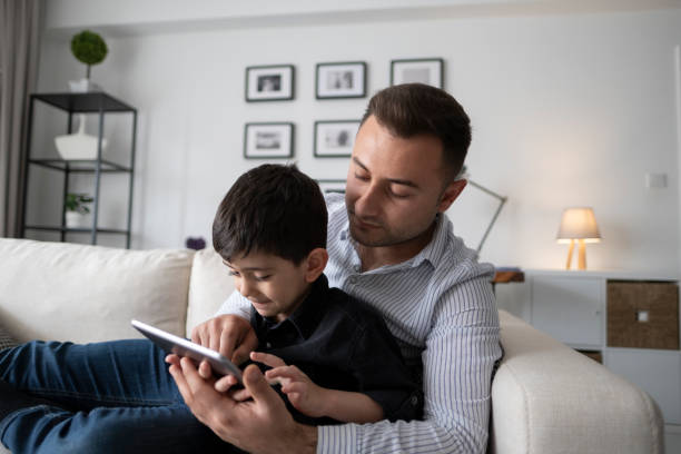 istock Playful father and boy 1454449288