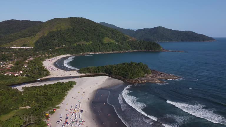 Amazing paradise beach in the middle of nature with green mountains