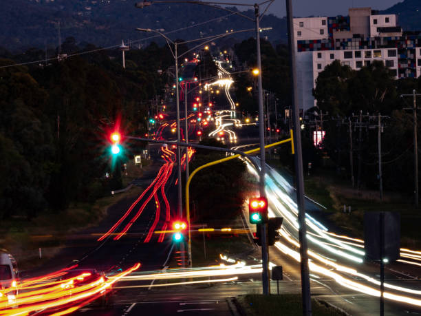 istock Light trail on suburban street 1454458148