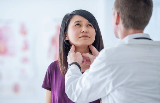 istock Male Doctor with a Patient 1454458702