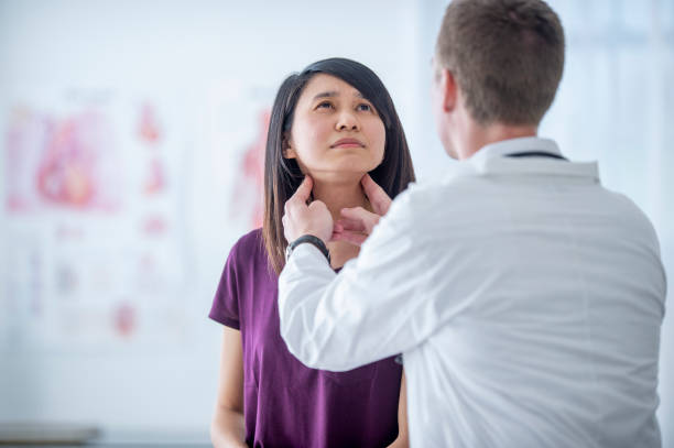 istock Male Doctor with a Patient 1454458704