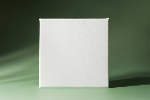 istock Blank canvas frame on minimalistic green background 1454460603