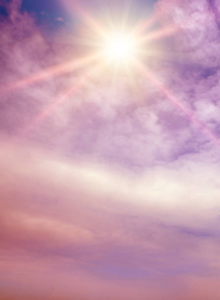 Fantastically beautiful sky in lilac tones and bright sun.
