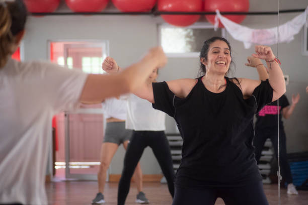 istock women learning to dance zumba 1454465929