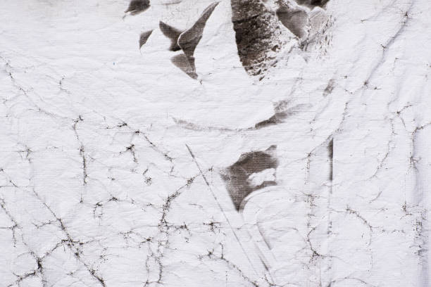 istock White and black fabric worn and weathered background texture 1454466894