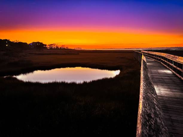 istock Wooden pier facing the horizon on the sunset 1454468068