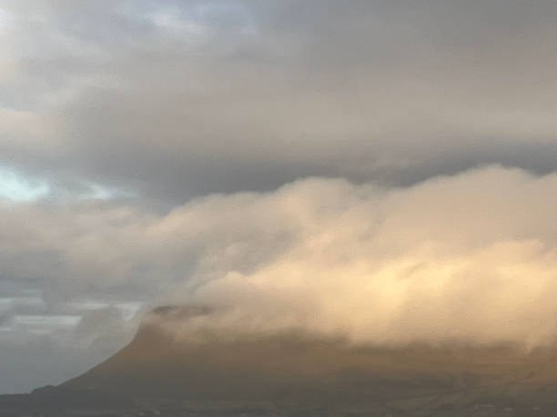 Benbulben mountain in County Sligo on a cloudy day Benbulben is a large mountain in Ireland. It is in Yeats Country. ben bulben stock pictures, royalty-free photos & images