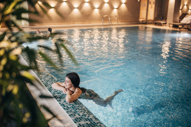 istock Woman in the pool 1454473382