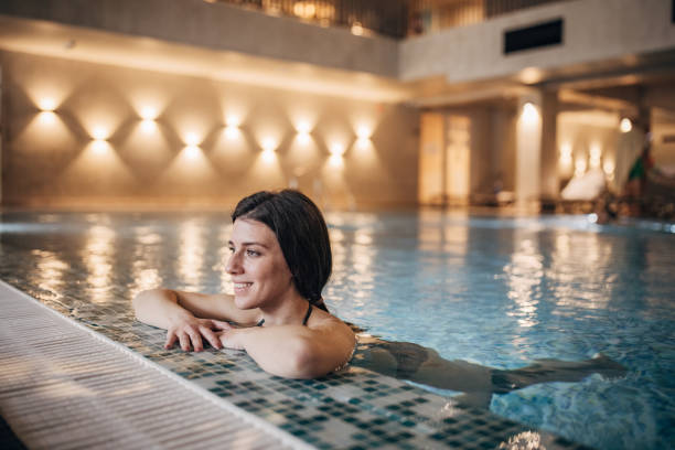 istock Woman enjoying in the pool 1454473410