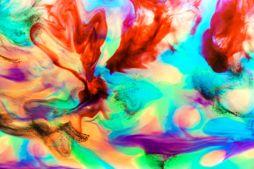 Color’s abstract fusion with a colored liquid.