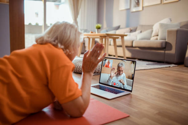 istock Senior woman talking to her husband over a video call 1454483093