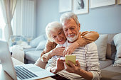 Senior couple using a phone