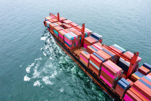 istock container vessels business and industry service export and import cargo by marine container vessels to distributing goods to consumers and supplier asia pacific and worldwide, aerial view 1454487093