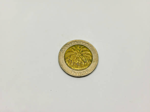 istock Indonesian 1000 rupiah coin brass palm icon 1454487870