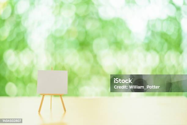 Blank Small Chart Board Whiteboard With Tripod Stand Holder For Business Presentation Empty Space For Drawing Specific Information As Needed Eg Market Share Growth Corporate Earnings Goals Etc Stock Photo - Download Image Now