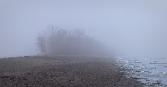 Point Pelee National Park in Southwestern Ontario represents the most southerly point of mainland Canada.  The park is also the smallest national park in Canada's national park system.  This photo depicts the southern most tip of the park during the winter with ice flowing along Lake Erie.