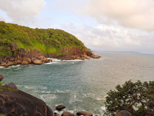 istock Butterfly beach in Goa.  Beach and rocks. 1454513936