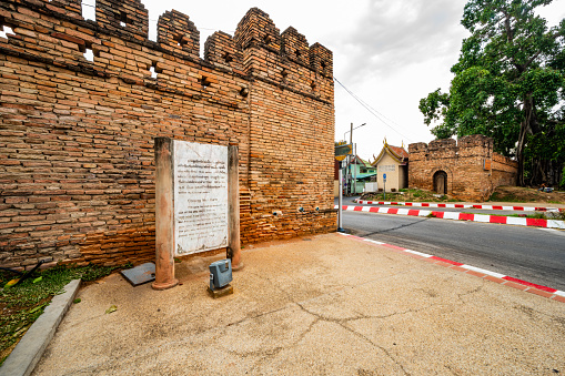 Chiang Mai, Thailand - April 26, 2020 : Chiang Mai Gate with city street, Chiang Mai province.