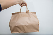 Diet nutrition and brown paper bag package with copy space, Healthy food delivery from a restaurant