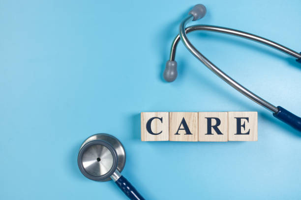 istock Care text on wooden cubes, medical concept. 1454521973