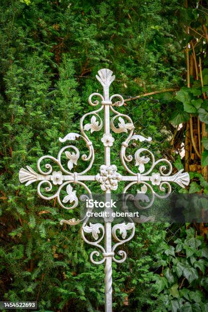 Historical Wrought Iron Burial Cross At The Cemetery Of Listed Village Chirch Giesendorf In Berlinlichterfelde Stock Photo - Download Image Now