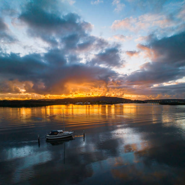 istock Dawn over the bay with clouds and orange highlights 1454523755