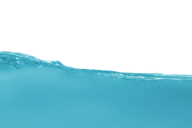 istock Water waves  in clear blue water. 1454525951