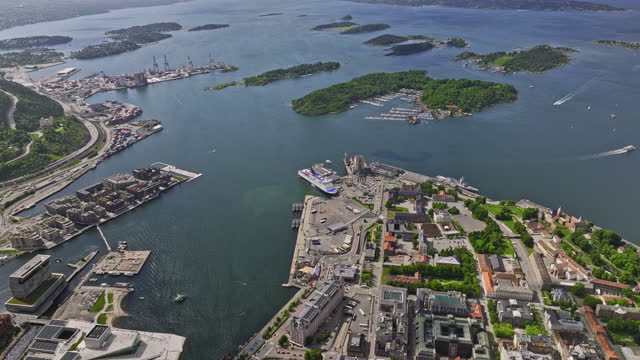 Oslo Norway v31 cinematic high angle birds eye view drone flyover sentrum and gamle neighborhoods capturing downtown cityscape and waterfront island landscape - Shot with Mavic 3 Cine - June 2022